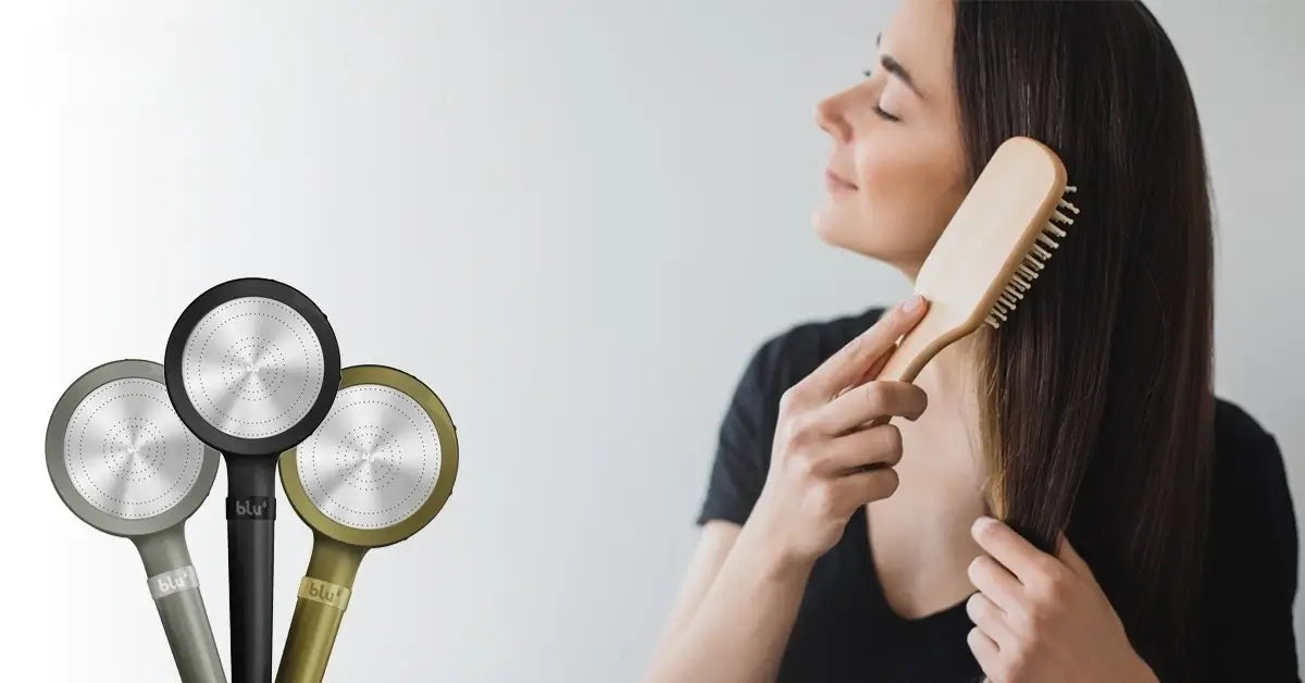 Woman combing her hair, with blu Ionic Shower Filter handheld models shown alongside