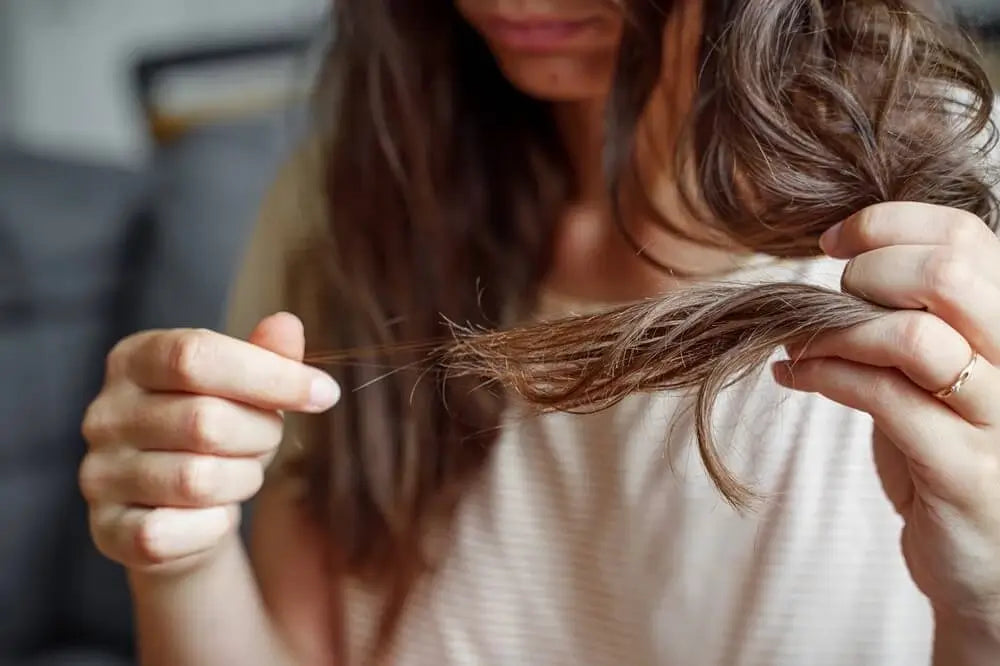 Woman struggling with hair loss
